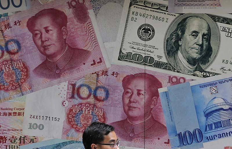 us is accusing china and manipulating currency